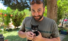 The video journalist Issam Abdallah holding a kitten