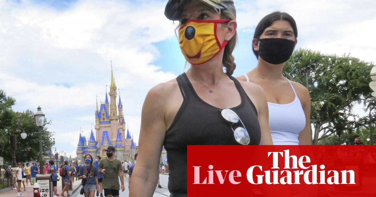 Coronavirus live news: Australia vaccine human trials to start, Trump wears mask in public - The Guardian