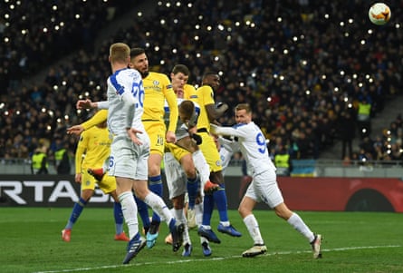 The Olimpiyskiy Stadium is illuminated by mobile phones as Olivier Giroud heads in to complete his hat-trick.