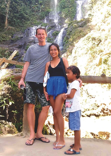 Tom Shelton, 42, in the Philippines in 2017 with his wife, Annie, and her son, Dandan.