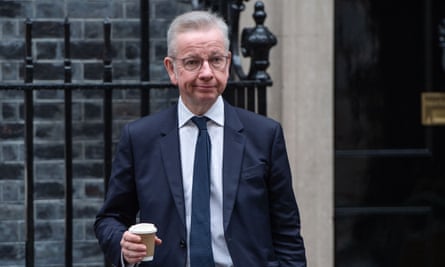 Michael Gove in Downing Street, holding a cup of coffee