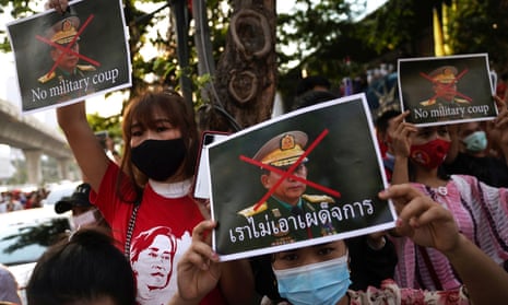 People protest against the coup outside Myanmar’s embassy in Bangkok, Thailand