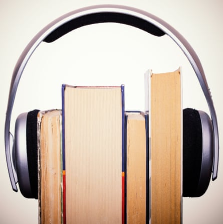 Headphones placed over books