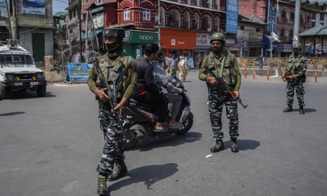 Indian paramilitary soldiers patrol in Srinagar, Indian-controlled Kashmir.