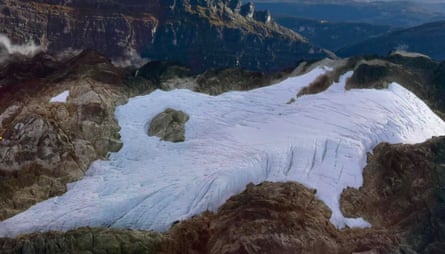 A large expanse of white sheet ice in a mountain range