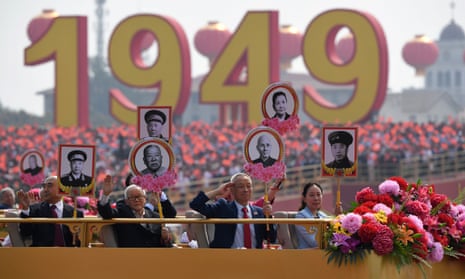 Relatives of revolutionary martyrs take part in a parade in Tiananmen Square in Beijing to mark the 70th anniversary of the founding of the People’s Republic of China. 