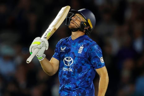 England's Jos Buttler celebrates his half century.