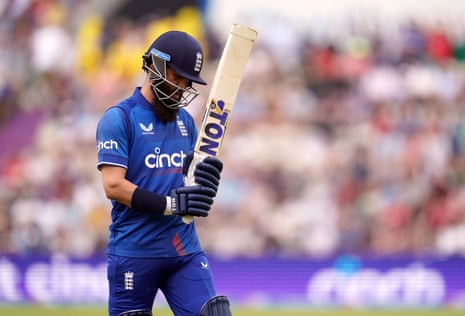 England's Moeen Ali walks off the pitch after losing his wicket.