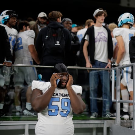 Luke Francis, a defensive lineman from London for the NFL Academy, on the phone straight after the match against De La Salle Spartans.