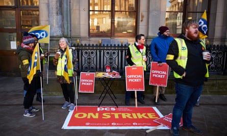 Members of the PCS union queue outside the Gambling Commission office in Birmingham