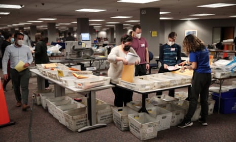 Picture of election officials counting absentee ballots in Milwaukee, Wisconsin