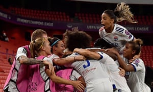 Lyon’s players celebrate Wendie Renard’s goal.