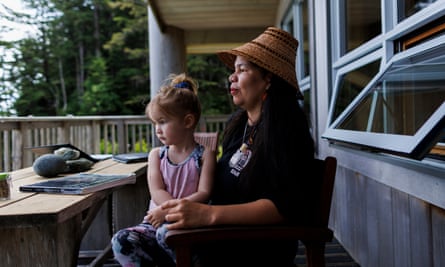 Grace Garvie sits with her daughter Haley at the Watchman cabin on SG̱ang Gwaay in the Gwaii Haanas reserve