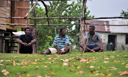 Disabled divers Willy Pamista, left, Mileno López Benedith, center, and Jaime Lemus Matute chat in Prumnitara, Puerto Lempira.