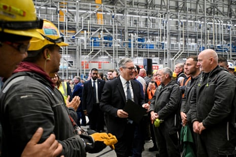 Starmer leaving after his speech at BAE Systems'Govan facility.