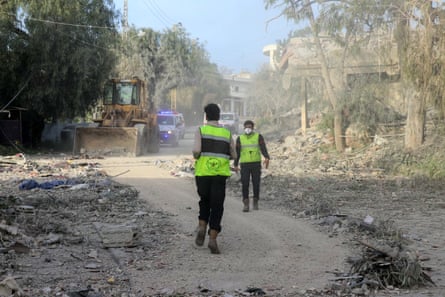 First responders gather at the site of an Israeli airstrike that targeted the southern Lebanese village of Srifa