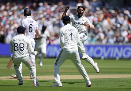 Nitish Kumar Reddy of India celebrates taking the wicket of Zak Crawley