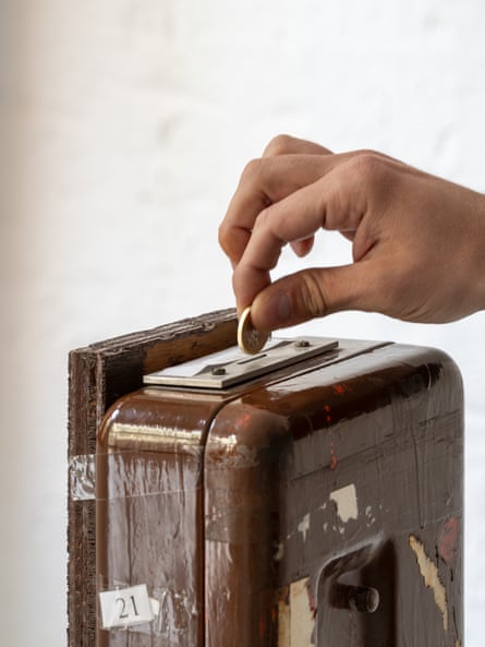 Cough up … the old coin machine from the church of San Giovanni Crisostomo, now in the show.