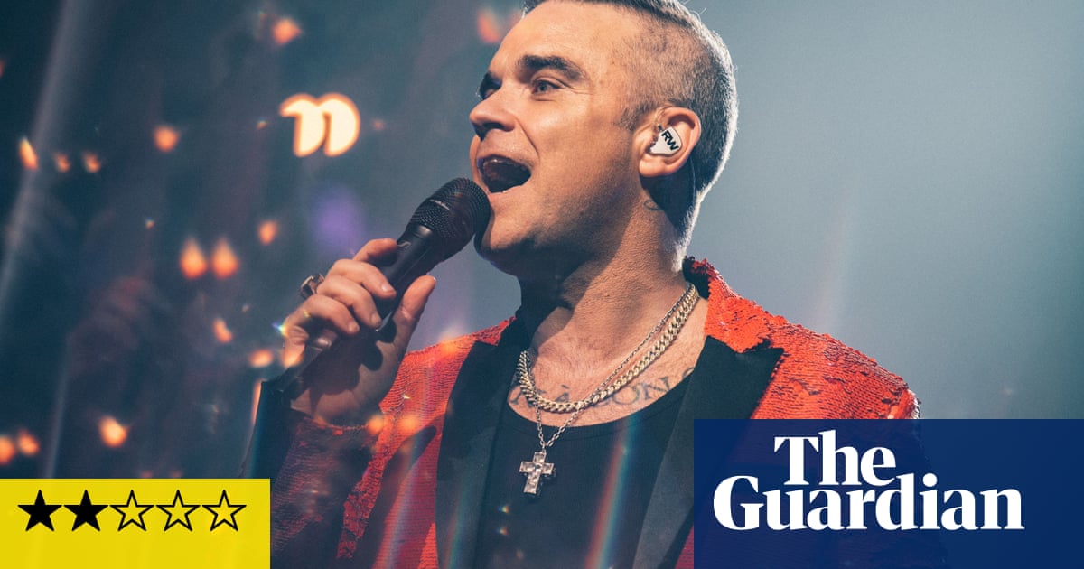 Robbie Williams review – Christmas party host is desperate to be loved