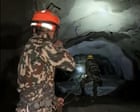 Nepal rescuers race to reach hundreds feared trapped in hydropower tunnels
