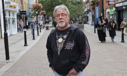 Michael in pedestrianised street with people in background