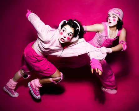Xhloe and Natasha running in pink clothes and clown faces