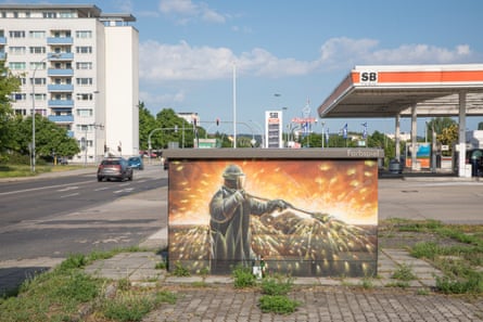 A mural depicting a steelworker.