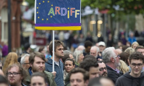 A man holds a pro EU sign during a anti-Brexit rally on June 28, 2016 on the Hayes in Cardiff, Wales