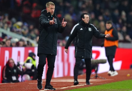 Graham Potter organises his West Ham team in front of the Aston Villa manager Unai Emery.