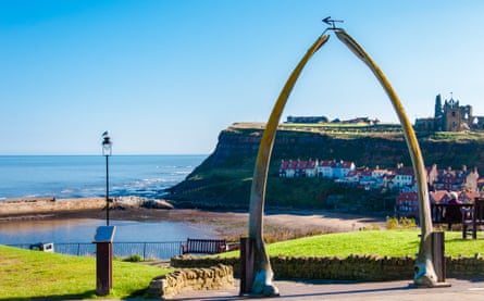 The Whalebone Arch in Whitby, with the abbey in background in North Yorshire, UK