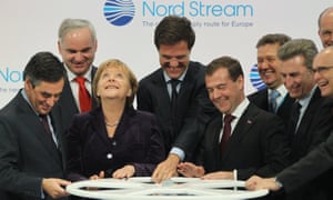 LUBMIN, GERMANY - NOVEMBER 08:  (From L to R, first row) French Prime Minister Francois Fillon, German Chancellor Angela Merkel, Dutch Prime Minister Mark Rutte, Russian President Dmitry Medvedev and European Union Energy Commissioner Guenther Oettinger turn a wheel to symbolically start the flow of gas through the Nord Stream Baltic Sea gas pipeline at a cemerony on November 8, 2011 in Lubmin, Germany.