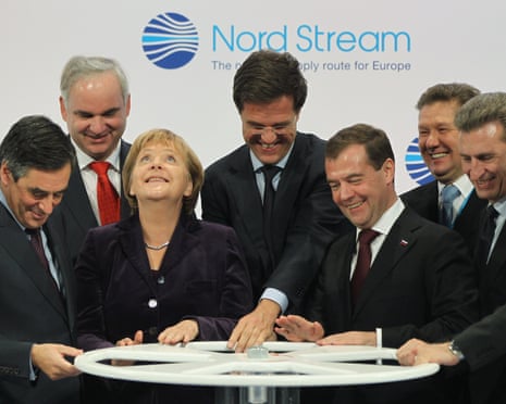French prime minister Francois Fillon, German Chancellor Angela Merkel, Dutch prime minister Mark Rutte, Russian President Dmitry Medvedev and European Union Energy Commissioner Günther Oettinger turn a wheel to symbolically start the flow of gas through the Nord Stream Baltic Sea gas pipeline at a cemerony on 8 November 2011 in Lubmin, Germany.