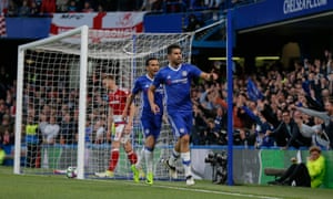 Costa celebrates scoring the opening goal followed by Pedro.