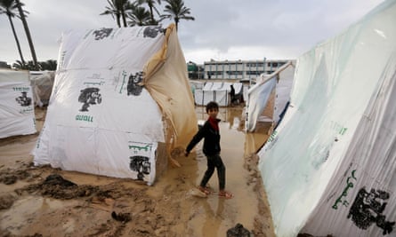 Adverse weather conditions amid the makeshift tents in Deir al-Balah, Gaza.