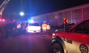 Emergency crews attend to the site of a train collision near Pine Ridge, South Carolina.