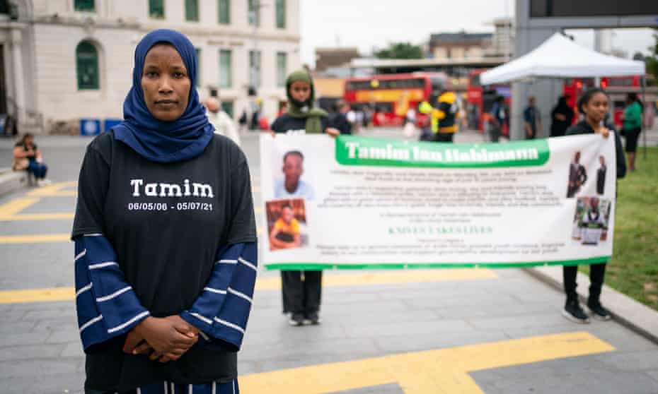 Hawa Haragakiza, the mother of Tamim Ian Habimana, 15, attends a vigil in Woolwich, London, to remember her son who was stabbed to death in July.