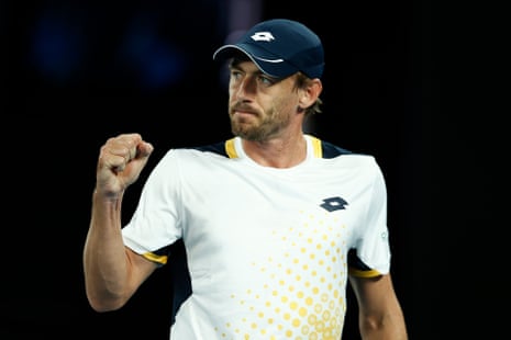 John Millman clenches his fist on winning a point.