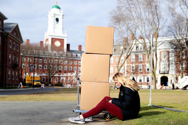 Jordan Di Verniero, a sophomore at Harvard, sits by her belongings before returning home to Ormond Beach, Florida. 