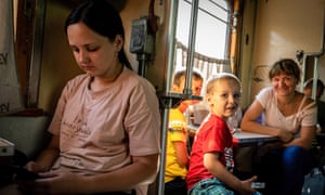 Donbas, Ukraine: Evacuated families travel on a train to Dnipro as the fighting intensifies in eastern Ukraine