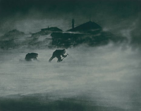 Blizzard at cape Denison. Whetter and Close trying to get ice for drinking water from a glacier. 1912