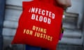 A bag printed with the words: 'INFECTED BLOOD – DYING FOR JUSTICE'