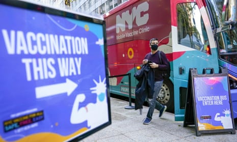 A man walks out of a vaccination bus at a mobile vaccine clinic in Midtown Manhattan.