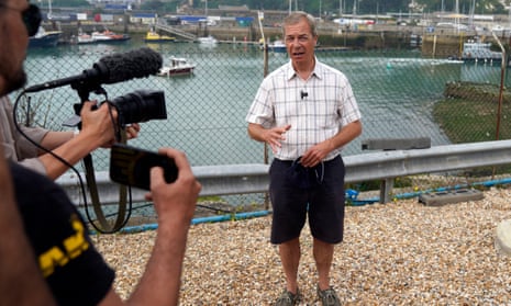 Nigel Farage filming at Dover last summer.