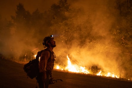 A firefighter monitors a blaze during the Mosquito fire near Foresthill, California, on 7 September 2022.