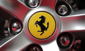 the Ferrari logo on a hubcap