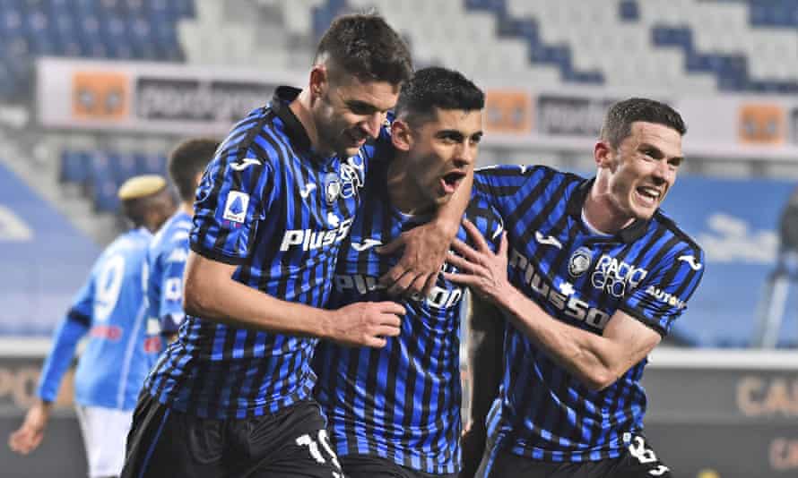 Cristian Romero (centre) celebrates his goal for Atalanta.