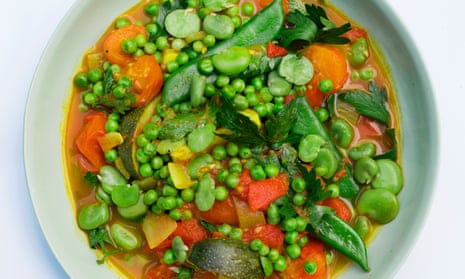 ‘Pop the broad beans from their skins while the sauce simmers’: spiced tomato with summer vegetables.