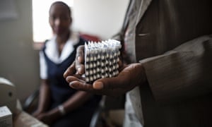 Medication is administered to an HIV patient in Malawi’s Thyolo district