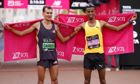 Emile Cairess (left) and Mahamed Mahamed pose together after the race