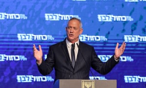 Retired Israeli general Benny Gantz, one of the leaders of the Blue and White (Kahol Lavan) political alliance, speaks before supporters at the alliance headquarters in Tel Aviv.